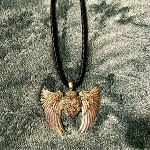 Biker necklace purchased at a bike rally years ago. Loved this one!